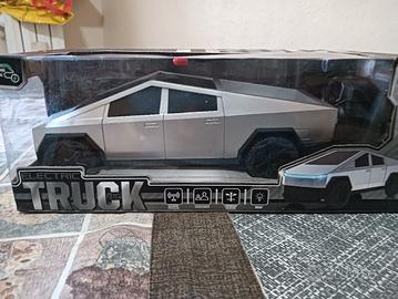 MODELLINO TESLA  SCALA 118 RADIOCOMANDATO