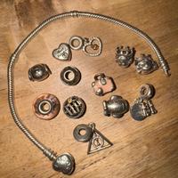 Bracciale pandora con 12 ciondoli originali