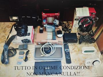 Fotocamera e  compreso di manuale e accessori vari