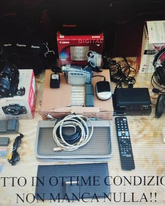 Fotocamera e  compreso di manuale e accessori vari
