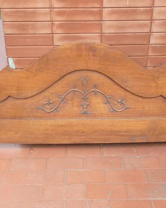 Testata letto singola in legno massello intagliato