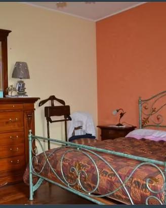 Camera da letto matrimoniale stile classico