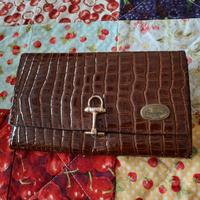 portafoglio da donna effetto pitone 