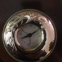 Orologio con cornice in argento