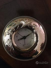 Orologio con cornice in argento