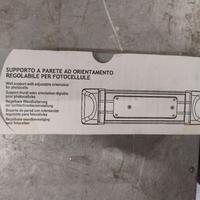 Supporto a parete ad orientamento per fotocellule 