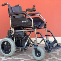 Carrozzina elettrica pieghevole come nuova