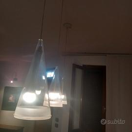 3 lampade di marca flos fucsia