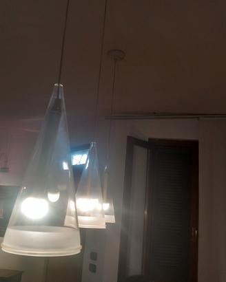 3 lampade di marca flos fucsia