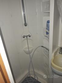 Camper mansardato con grande garage