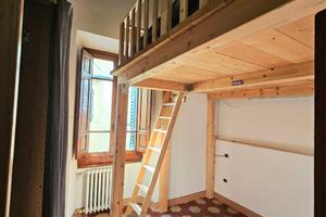 Camera con bagno privato e soppalco vivibile