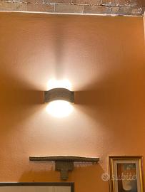 Lampade e mensole in pietra calcarea