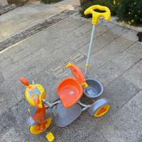 triciclo con comando maniglia per passeggiata