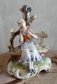 STATUINA SOPRAMMOBILE 