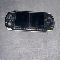 PSP+custodia+caricatore+ 4 giochi 