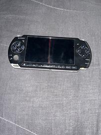 PSP+custodia+caricatore+ 4 giochi 