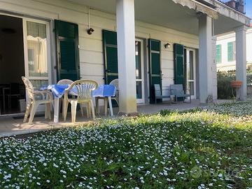 TRILOCALE CON GIARDINO e POSTO AUTO