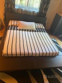 Letto di Poltrona Frau king size in pelle marrone