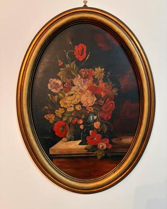 Quadro floreale vintage con cornice dorata ovale