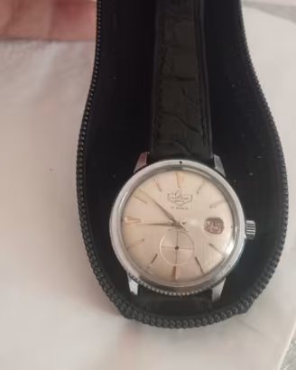 Orologio carica manuale 1950