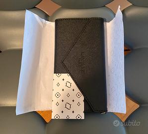 Pochette nera con tracolla rimovibile