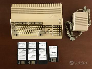 Amiga 500 + PSU + 11 Floppy Games. Recapped.