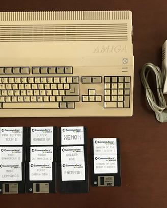 Amiga 500 + PSU + 11 Floppy Games. Recapped.