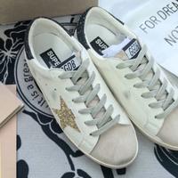 Sneakers Golden Goose con stella glitter argento