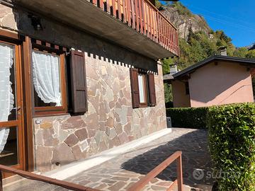 Bilocale con terrazza solarium e giardino