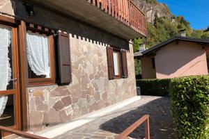 Bilocale con terrazza solarium e giardino