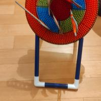 Asce e stelle ninja con bersaglio