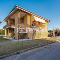 Appartamento piano terra con giardino ed accessori