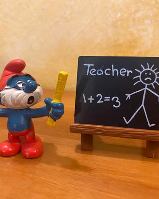 Puffo insegnante originale con lavagna