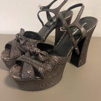 Sandali aperti alti Yves Saint Laurent pitone