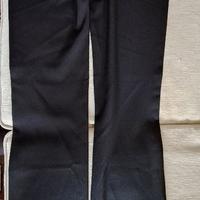 Pantalone nero con profili in oro