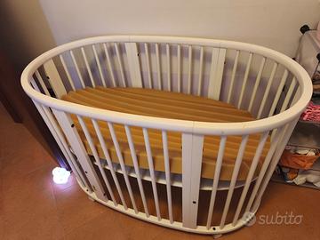 next to me stokke evolutiva