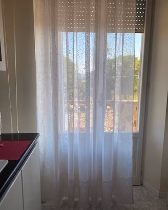 Set tende tessuto leggero e rosato