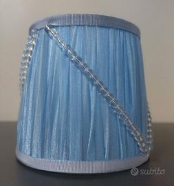 Paralumi azzurro in tessuto plissettato