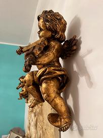 Putti legno dorato