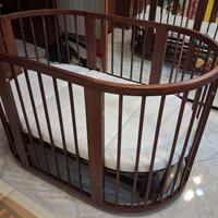 Lettino per bambini con meccanismo a dondolo