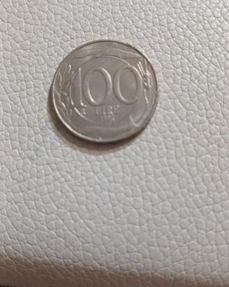100 lire errore conio testa  capovolta