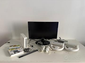 Nintendo Wii bundle + 2 Wii Remote + giochi + moni