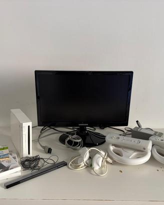 Nintendo Wii bundle + 2 Wii Remote + giochi + moni