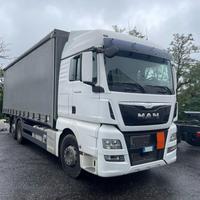 MAN TGX 26.400 - CENTINATO CON SPONDA CARICATRIC