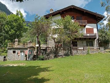 Accogliente Bilocale con Giardino e Barb