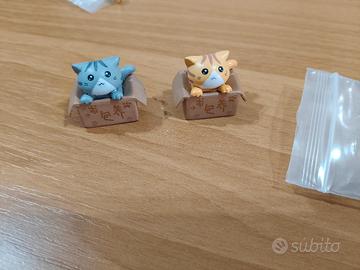 2 pomelli a forma di gattino 