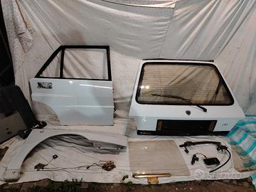 PEZZI LANCIA DELTA:Porta Baule Parafango  Vetro 