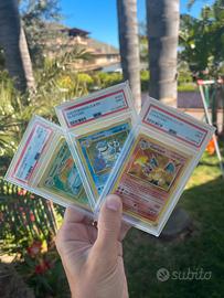 Carte pokemon trio psa 9