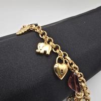 Bracciale Oro Giallo 18 Kt con Charms