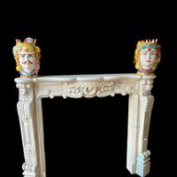 Cornice camino in marmo scolpito